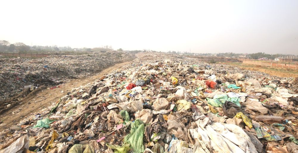 A mass of thrash, mostly comprising of plastic waste piled at the Dimapur Municipal Council garbage dumping site located in Burma Camp. Despite a standing government ban, single-use plastic carry bags are still found in the market and find its way to the disposal site. (Morung Photo)
